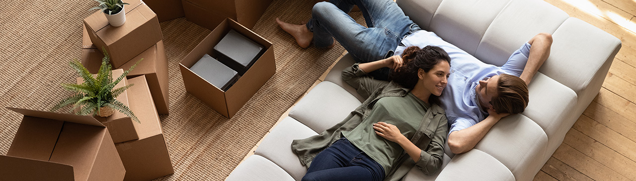 A couple relaxing on a couch