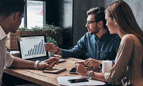 A couple speaking to a financial expert